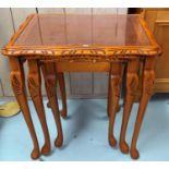 A nest of 3 reproduction yew occasional tables