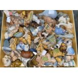 A selection of Wade Whimsies and Disney figures; a selection of Royal Commemorative and decorative