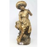 A Goldscheider figure: girl in sunhat holding a fish, impressed 'Goldscheider 191 G32, 9, signed '