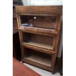 An early 20th century oak sectional bookcase, 3height, width 5 cm
