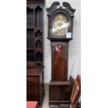 An 18th century Scottish mahogany longcase clock, the hood with swan neck pediment, carved flower