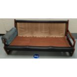 A mid century teak G-Plan style settee with vinyl backing, length 174 cm