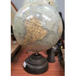A geographic terrestrial globe, 10" showing railways, etc., on Bakelite base, height 3 cm