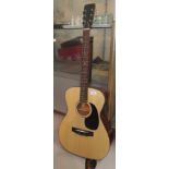 A Saxan Folk model acoustic guitar