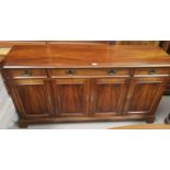 A reproduction sideboard with 3 drawers over 3 cupboards, length 152 cm