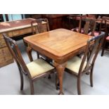 A 1920's mahogany draw leaf dining table on cabriole legs; a set of 4 similar Queen Anne style
