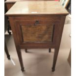 An Edwardian mahogany pot cupboard on square tapering legs