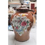 A Chinese porcelain cafe au lait coloured glazed baluster vase with floral panels (rim restored with