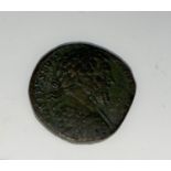 A copper Roman coin attributed to Septimus Severas Sestertius circa 200AD