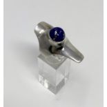 An unusual Georg Jensen ornate silver ring stamped 925s Denmark, numbered 154 with Lapis Lazuli