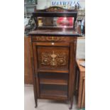 An Edwardian rosewood mirror back cabinet with extensive bone and marquetry classical inlay enclosed