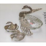 A glass white metal "Swan" bowl with hinged wings stamped 835 (one wing af); a smaller similar