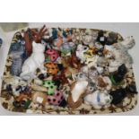 A large selection of miniature animals; a Victorian pair of boy cricketer figures (some chips);