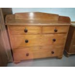 A Victorian stripped pine washstand with raised back, 2 long and 2 short drawers