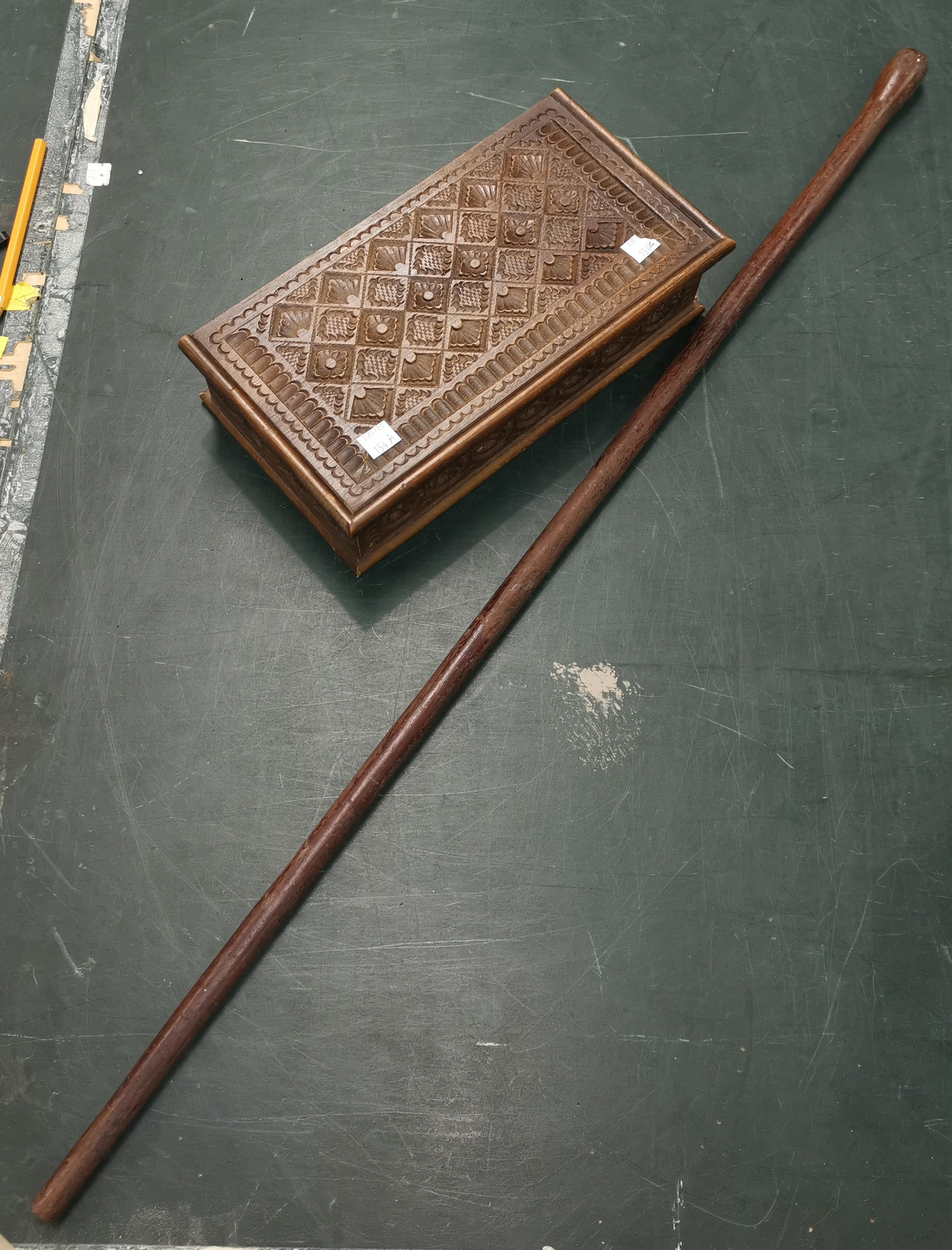 A hardwood walking stick; a carved wooden box