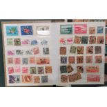 A selection of Chinese stamps in albums and on sheets