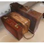 A vintage suitcase ; a tan leather overnight bag; a crocodile effect briefcase