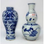 A Chinese blue and white double gourd vase, ht 19.5cm and a Chinese blue and white baluster vase (
