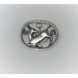 A Georg Jensen silver pierced oval brooch, Kneeling Deer, initials impressed in box, stamped 925
