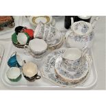 A Royal Albert Silver Maple 20 piece part tea set; a Carlton Harlequin 12 piece coffee set