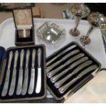 2 cased selections of silver handled table knives and a cased silver napkin ring