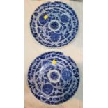 A pair of Chinese blue and white plates 25cm (both with chip to rim)