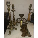 A pair of brass table lamps; 2 Art Nouveau lamps; 2 brass finger plates
