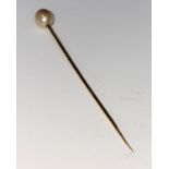 A pearl stick pin