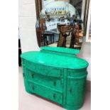A 1950's dressing table in later green finish with 2 cupboards and 5 drawers and stool