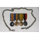 A group fo 4 miniture medals including 2 Territorial Force medals awarded to sergeant Major D E
