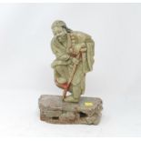 A Chinese soapstone carving of a farmer on naturalistic stone base height 26cm