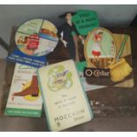 A selection of vintage cardboard advertising signs Clarks shoes and others