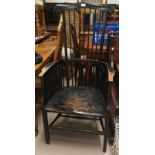 An ebonized stickback Windsor armchair