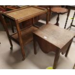 A Georgian oak commode stool; a 2 height oak tea trolley with detachable trays