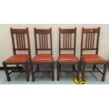 A set of 4 oak dining chairs in the Arts & Crafts style, with high backs, on chamfered legs and