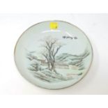 A Chinese porcelain hand painted plate with rural scene Chinese characters to the front and back,