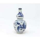 A Chinese blue and white double gourd vase decorated with phoenix with white metal rim, 11.5cm