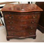 A mahogany reproduction bachelors chest in the George III style, with 4 long drawers and brushing