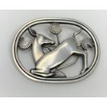 A Georg Jensen sterling silver brooch stamped 925 Denmark numbered 256 oval shaped with kneeling doe