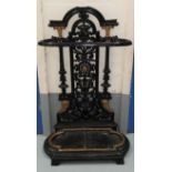 A black and gilt painted cast iron stick stand