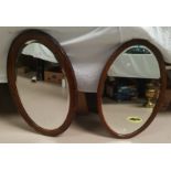 Two bevelled mirrors in frames