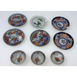 A selection of oriental tea bowls and dishes