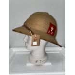 Lancashire Fusiliers, a tropical pith helmet, red cloth badge, c. 1920's and stand