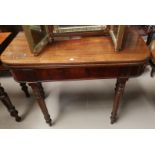 An early 20th century fold over tea table