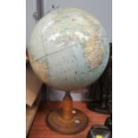 A Philips Standard Globe, diameter 13.5", with compass in base, on wooden stand, height 55 cm