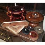 A selection of oriental stained wood urn stands