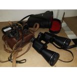 A WWII pair of binoculars by G Fournier of Paris, cased; a modern pair of binoculars