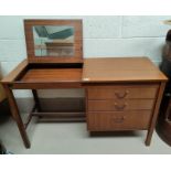 A 1960's teak desk with single pedestal