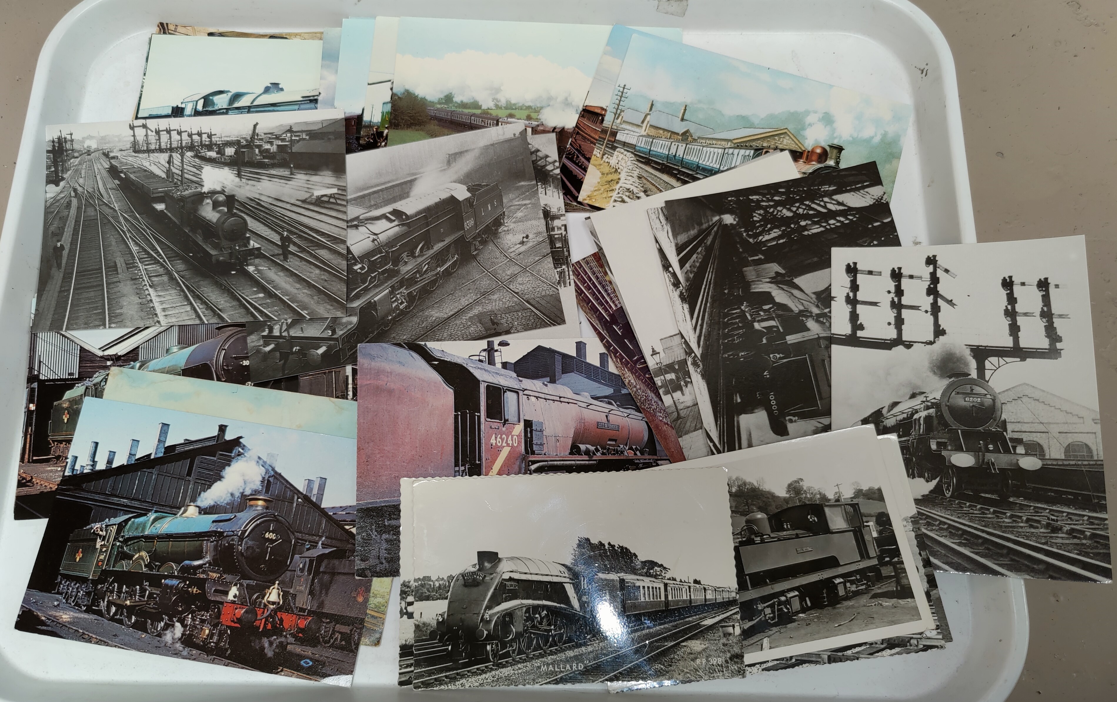 A selection of transport post cards mainly steam trains etc