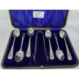 A cased set of six hall marked silver old English pattern with reeded terminals coffee spoons and
